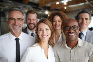 Group of Professional People Standing Together Smiling Looking at the Camera photo