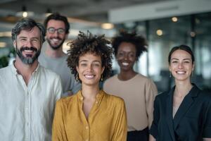 Diverse Group of Professionals Collaborating in an Office Setting and Smiling Together photo