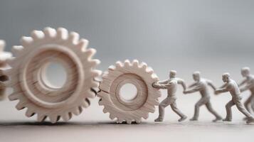 The Teamwork of Tiny People Turning Gears Illustrates Unity in Progress photo