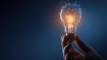 Illuminating Innovation A Hand Holds a Lightbulb Bursting with Creative Energy photo