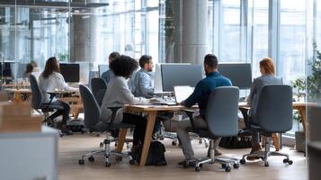 An Office Space With Several People Working At Desks Doing Work photo