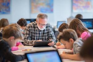 Dedicated Teacher Guiding Students Through Interactive Learning with Technology and Hands On Activity photo