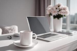 Calm Workspace with Laptop Coffee Flowers and Sunlight for Productivity Boost photo