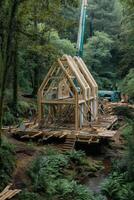 Wooden Building Structure Assembled on the Forest Ground By the River Side photo