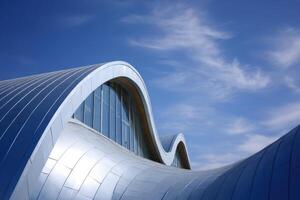 Architectural Marvel A Stunning Wavy Structure Building under Bright Blue Sky Clouds photo