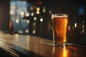 A Cold Glass of Beer Sitting on the Wooden Counter at Pub photo