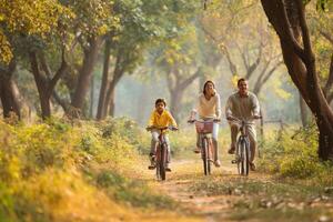 Enjoyable Family Time Biking Outdoors On Beautiful Sunny Fall Season Day photo