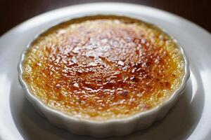 A white plate with a dessert on it photo