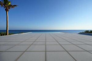 Beach Background Serene Ocean View Infinity Pool and Modern Patio Tiles by the Sea photo
