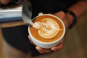 Coffee Background Expert Barista Pouring Latte Art Coffee Preparation Closeup photo