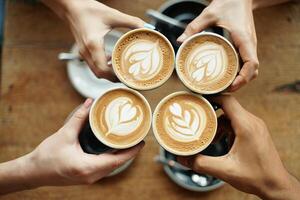 Coffee Background Four Friends Enjoying Latte Art Coffee Top View Cozy Cafe photo