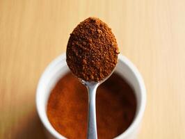 Coffee Background Ground Coffee Spoonful Above Bowl Dark Roast Caffeine Beverage photo