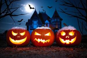 Halloween Background Spooky Halloween Jack o lanterns Glowing at Night Haunted House Background photo