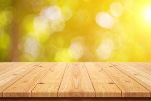 Nature Background Sunny Summer Background Empty Wooden Tabletop with Bright Bokeh Blur photo
