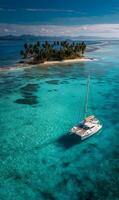 Idyllic tropical getaway small island paradise with turquoise waters and a sleek sailboat vacation photo