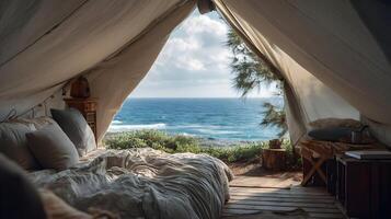 Luxurious coastal camping retreat providing a stunning ocean view from the comfort of a tent getaway photo