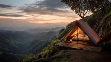 Idyllic camping scene overlooking mountain landscape at dusk offering a luxurious escape to nature photo