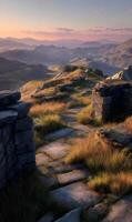 Scenic mountain landscape at dusk with rocky path and distant peaks bathed in soft warm light photo