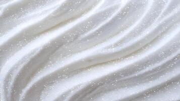 Luxurious shimmering white cream texture with elegant waves and sparkling glitter for a refined look photo