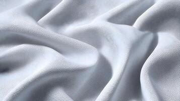 Captivating white fabric texture showcasing subtle folds and a textured surface creating an elegant backdrop photo