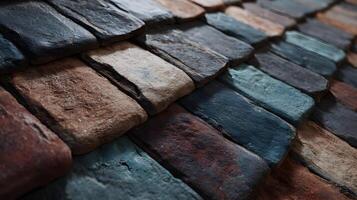 Textured surface of colorful stone tiles in a close up view creating an interesting pattern design photo