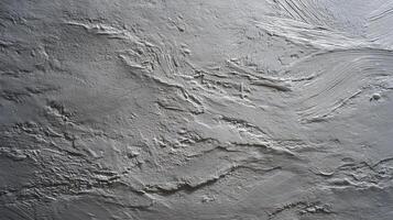Abstract texture of grey paint strokes on a rough surface creates depth and tactile sensation revealing artistic creation photo