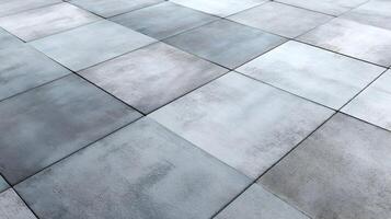Elegant concrete tiles showcase subtle color variations in an abstract geometric pattern for modern design photo