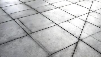 Abstract pattern of concrete floor tiles casting subtle shadows forming geometrical grid design photo