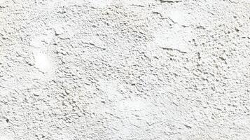 Distressed white stucco wall texture captures urban decay with rough surface and subtle shadows creating a unique backdrop photo