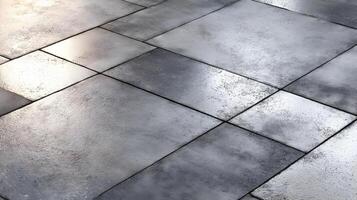 Elegant stone tile arrangement displaying a geometric pattern and subtle light reflections on surface photo