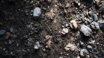 Textured earth surface revealing the geological tapestry a detailed view of rugged terrain photo