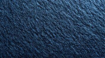 Deep indigo wool texture a cozy and inviting textile perfect for backgrounds and design applications photo