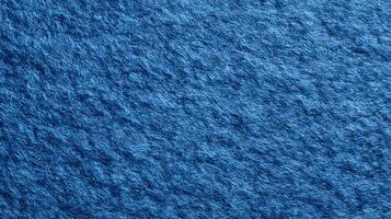 A detailed view of a vibrant blue fabric featuring a soft and slightly rough texture creating a captivating surface photo