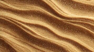 Golden sand dunes create a mesmerizing wavy pattern under the sunlight creating a unique texture photo