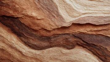 Geological marvel displaying layers of sandstone in warm earthy tones creating abstract patterns and textures photo