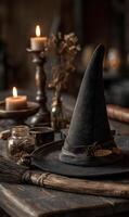 Enchanting Halloween Still Life Featuring Witch Hat Candles and Magical Elements on Rustic Wooden Table photo