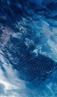 Abstract textured blue background with flowing lines creating a dynamic and refreshing impression design photo