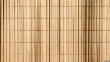 Detailed close up of woven bamboo matting forming a textured background creating a warm inviting scene photo