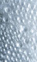 Abstract background with bubble wrap texture creates soft light reflections ideal for packaging materials design photo