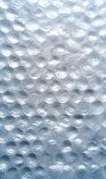 Captivating abstract texture featuring an array of translucent spheres creating a mesmerizing bubbly pattern reflecting light and depth photo
