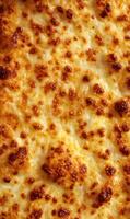 Golden perfection a close up of bubbling melted cheese creating a delicious and inviting texture appetizing food photography photo