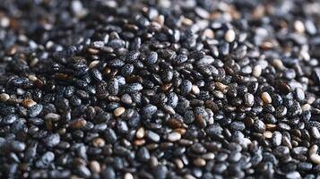 Abundance of tiny chia seeds displayed in a close up view showcasing texture and pattern of nature photo