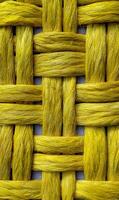 Intricate weaving creates a captivating textured pattern featuring yellow strands a visually stunning design of craftsmanship photo