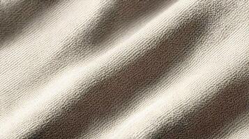 Textured fabric with subtle undulations creates a soft and inviting abstract background texture photo