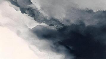 Abstract indigo wash ink blot with textured white background creating a tranquil and ethereal mood photo