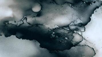 Abstract ink wash painting with dark and light tones creating a fluid marbled effect background photo