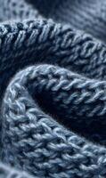 Close up of cozy knitted fabric in shades of blue creating a soft and inviting texture background material photo