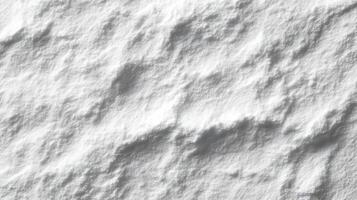 Close up on textured white surface with shadows creating depth and contrast, soft snowy look photo