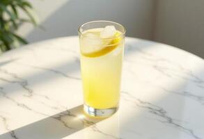 A lemonade drink with ice and a slice of lemon photo