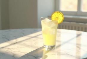 A lemonade drink on a table with a window in the background photo